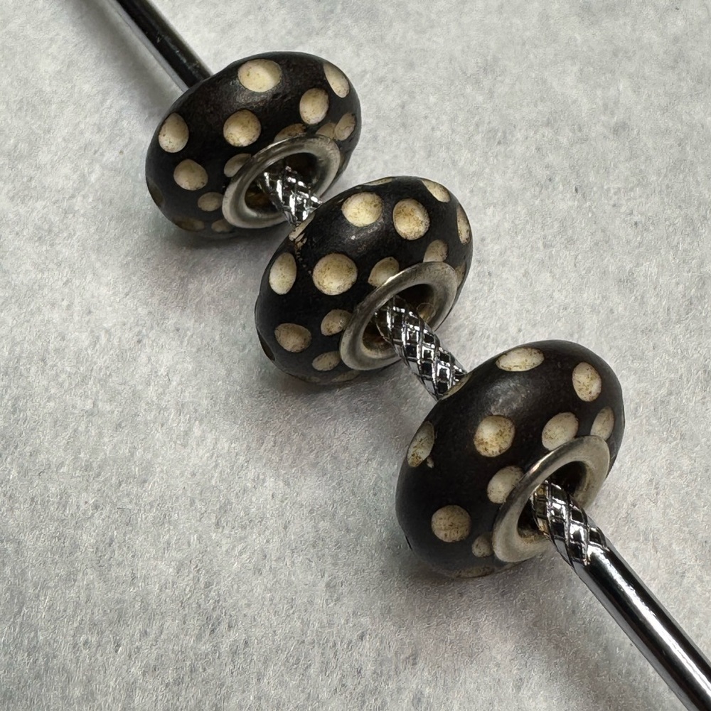 5/$20 single carved Charm Bead